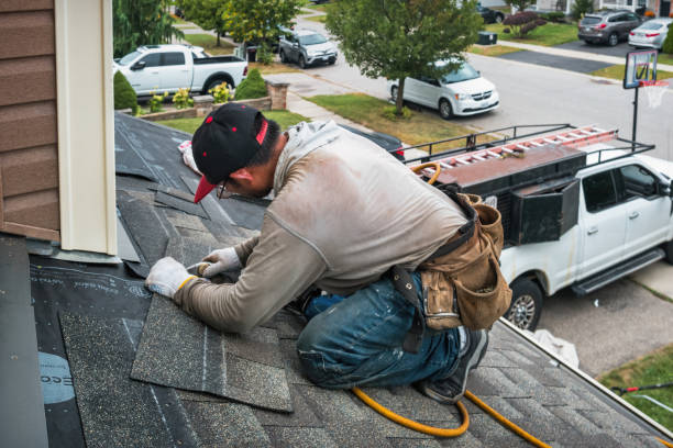 Professional Roofing technician working in Cortland, NY